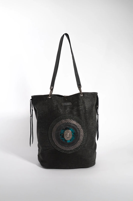 Luxury handcrafted black leather shopper bag with medallion, artisan design from Linda Ibiza.