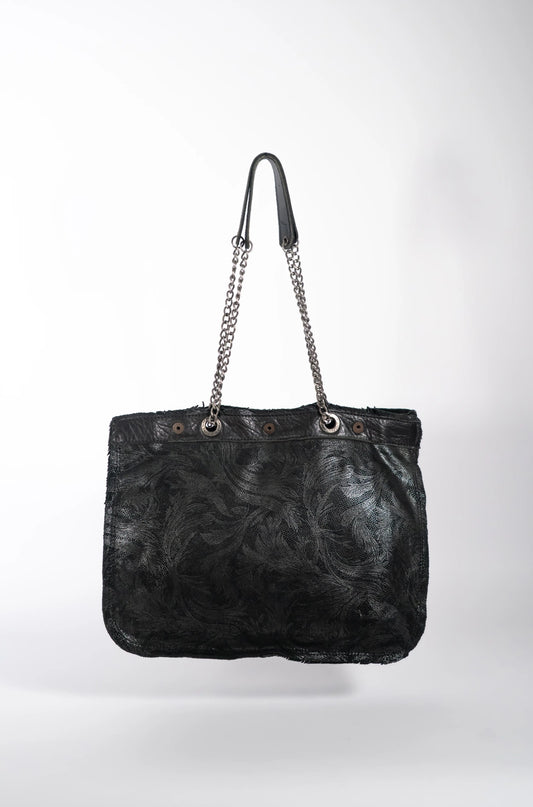 Large black leather shopper bag worn over the shoulder, handcrafted luxury from Ibiza.