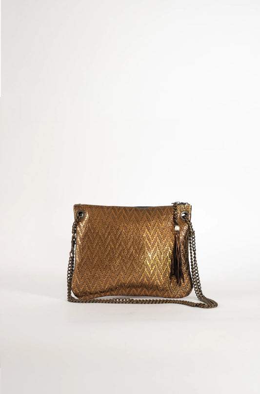 Luxury handcrafted gold leather chic bag, artisan fashion design from Linda Ibiza.