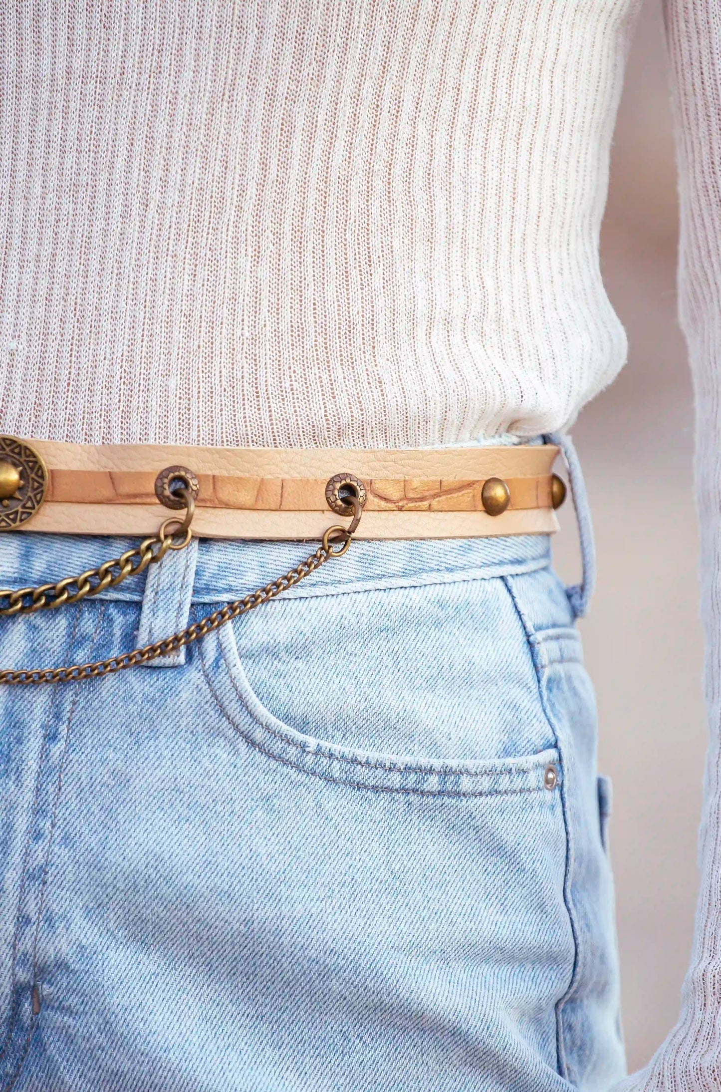 Premium cowhide leather belt in golden beige, versatile accessory for dresses and boho outfits.