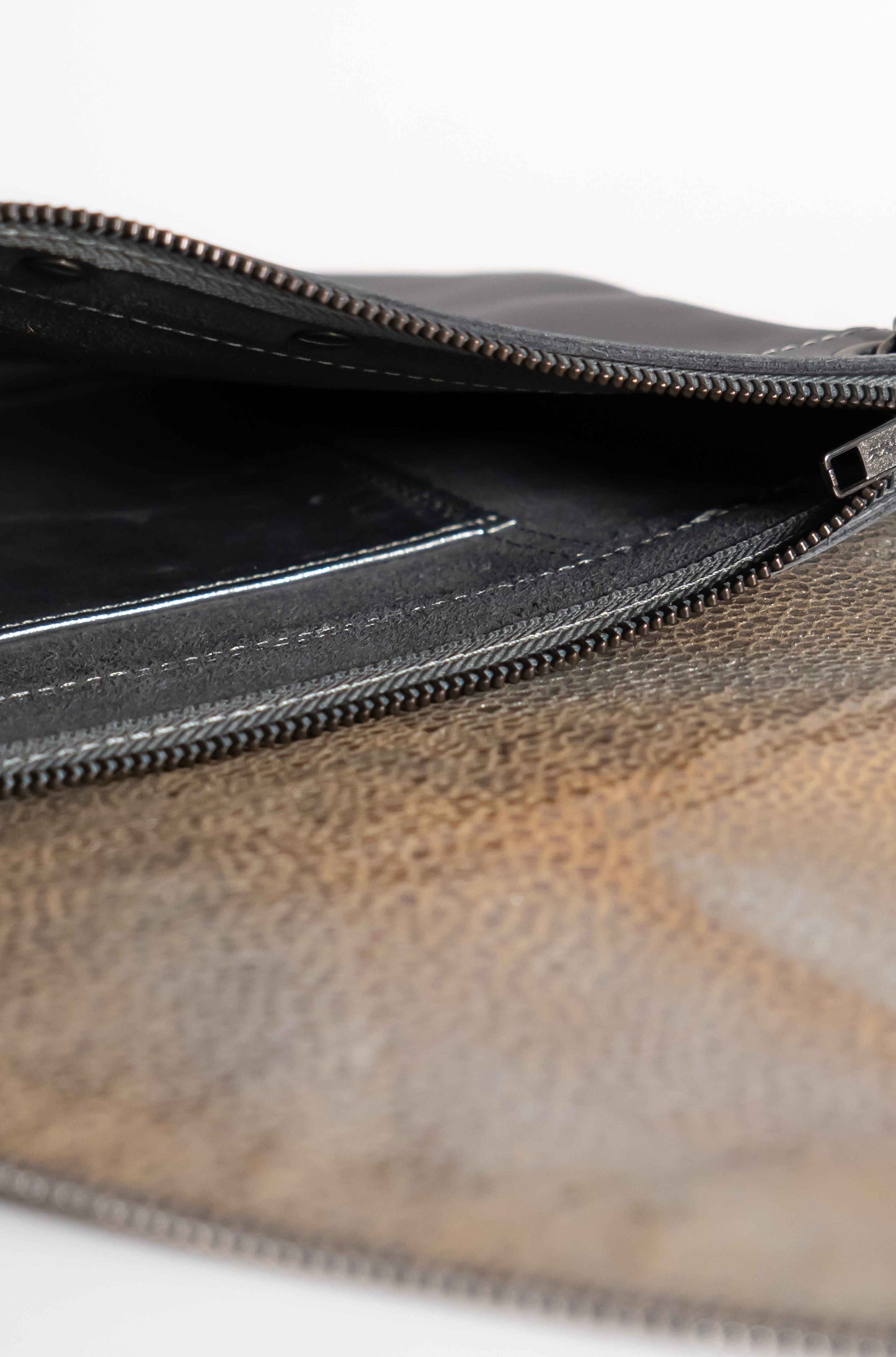 Grey handmade leather V handbag with woven leather crosshatch detail