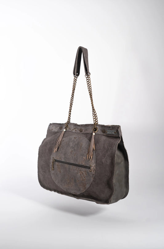 Handmade textured purple leather shopping bag with chain and leather straps.