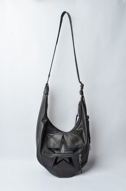 Luxury handcrafted black leather urban crossbody bag with star detail by Linda Ibiza.