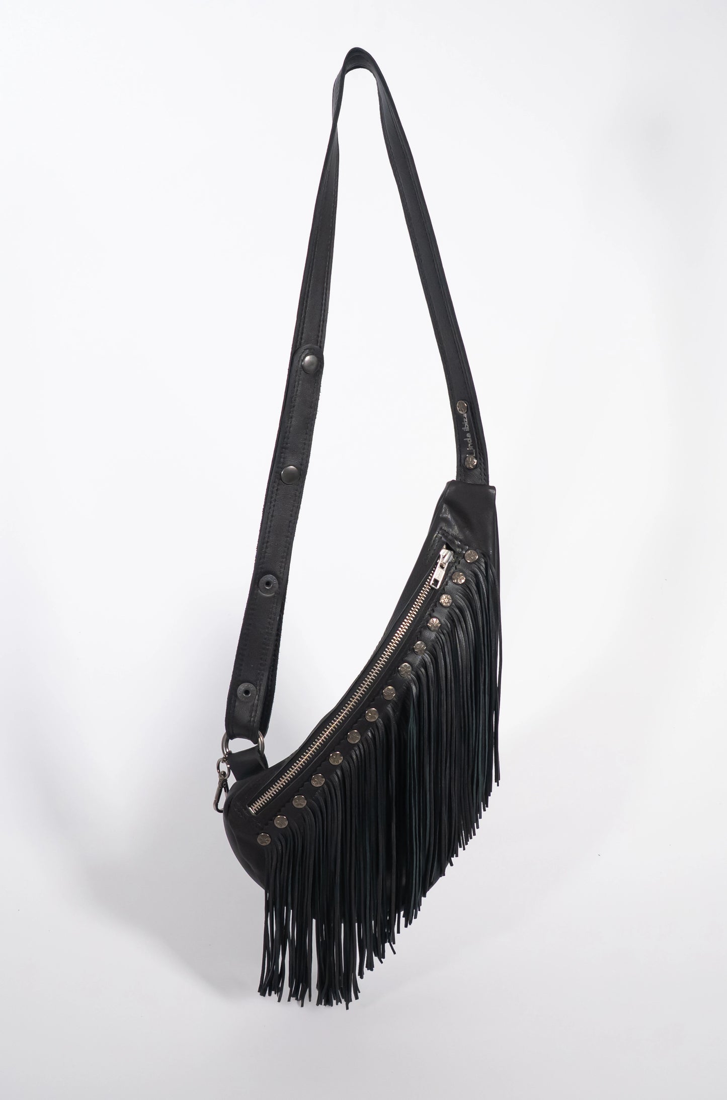 Handmade black leather sling bag with fringes - left or right side options