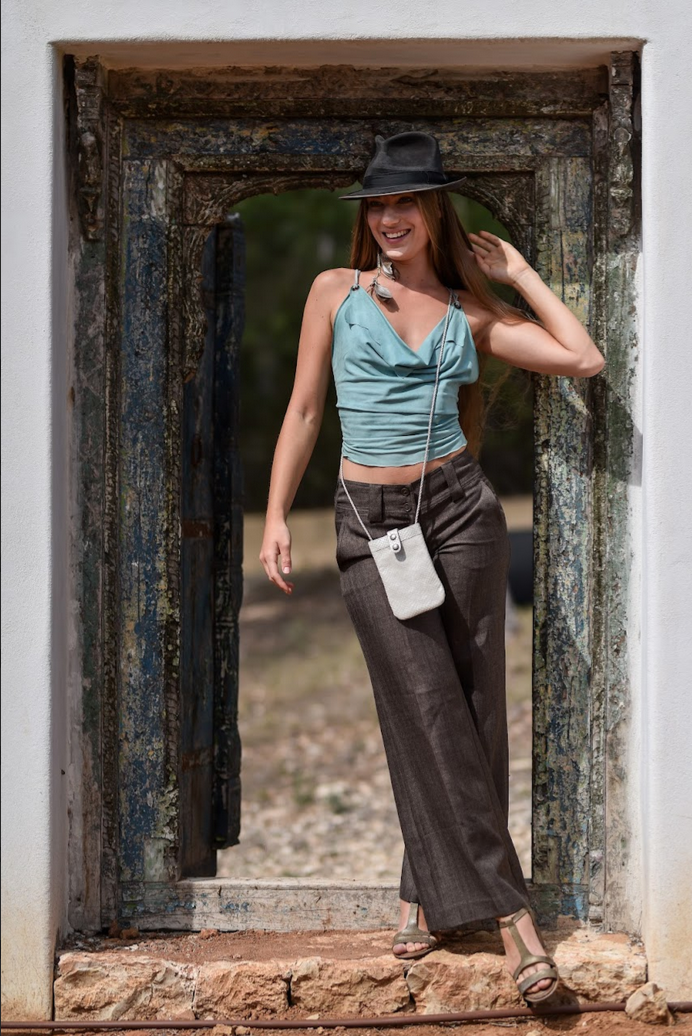 Metallic cream leather mobile bag with zip pocket on the back