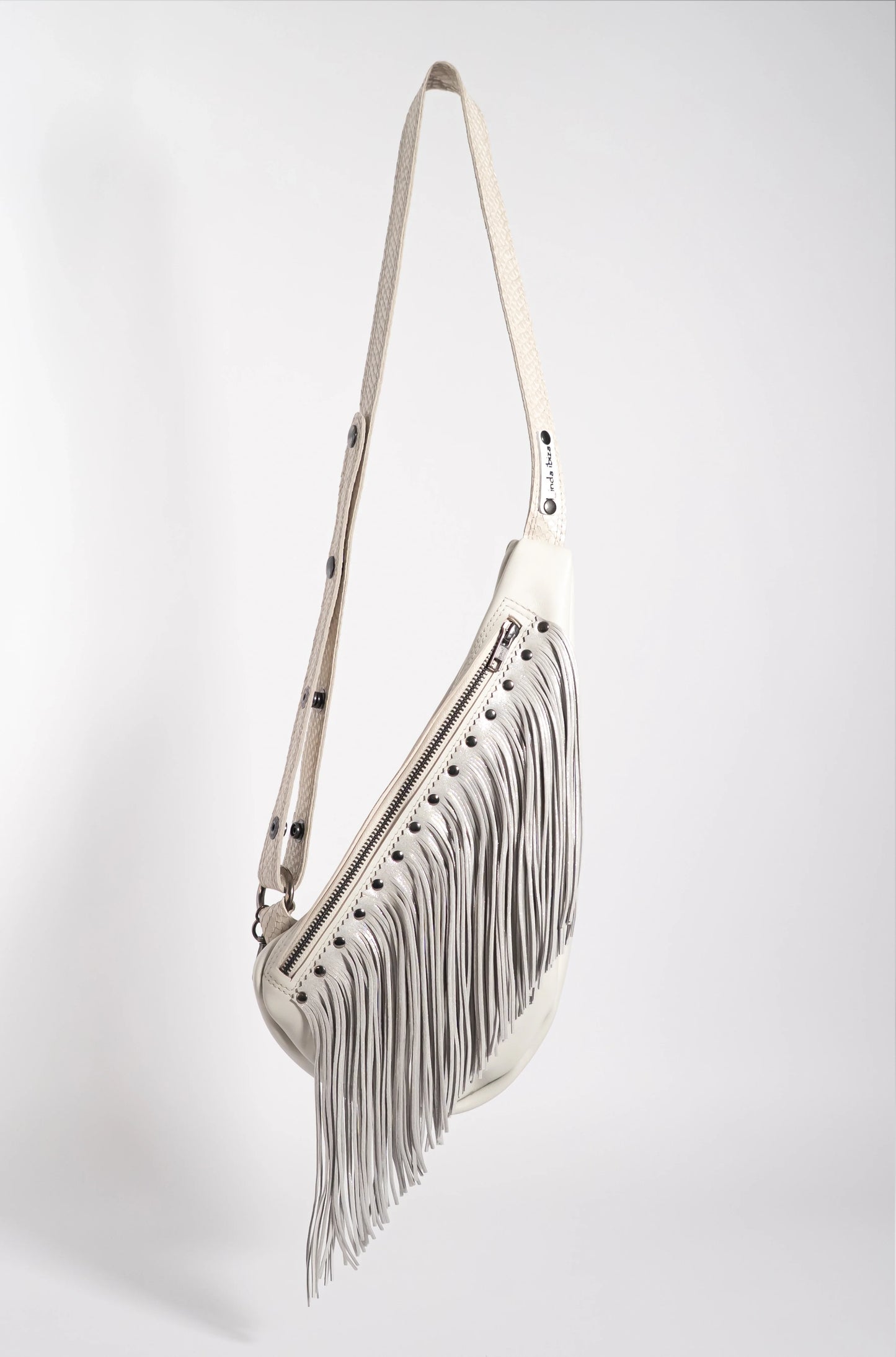 Handmade white leather sling bag with fringes